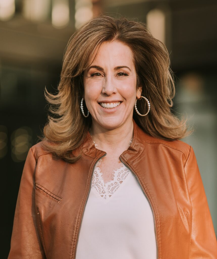 Jill Sitnick wearing a brown jacket