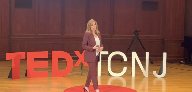 Jill on stage at TEDx